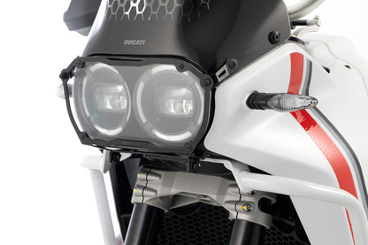 Wunderlich foldable “CLEAR” headlight guard - black